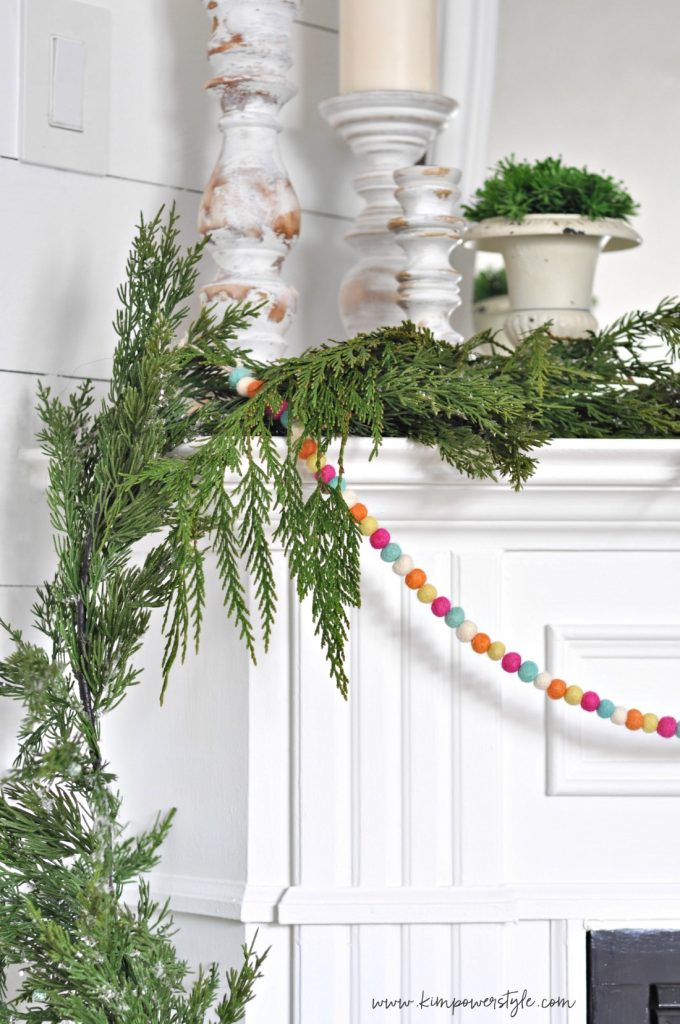 Pom pom garland on the mantel